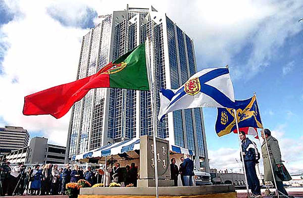 The flags were flying at Purdy's Wharf during an unveiling of a monument honouring the Portuguese explorer, Joao Alvares Fagundes, believed to be one of the earliest settlers of Nova Scotia.